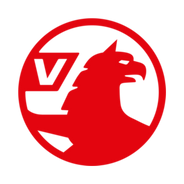 Vauxhall logo in red featuring a stylised griffin holding a flag within a circular emblem.