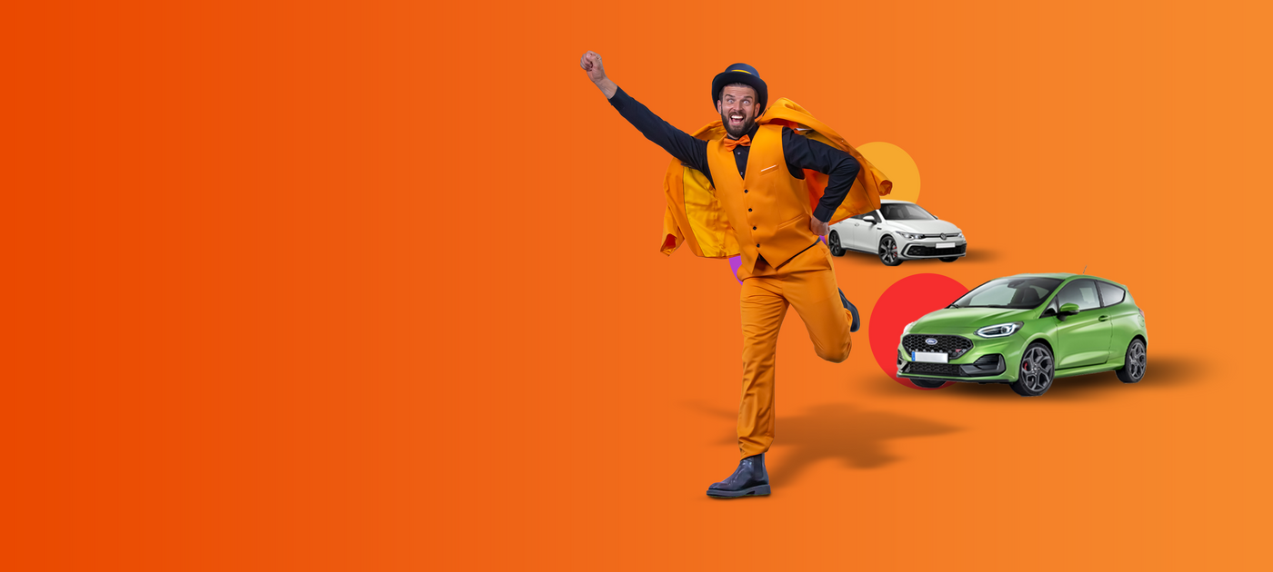 Man in an orange suit and top hat jumping in excitement next to a white car and a green car on an orange background with red, yellow, and green circles.